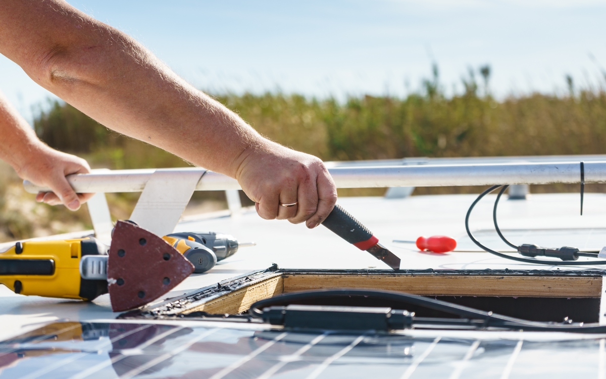 A Hand Holding A Tool